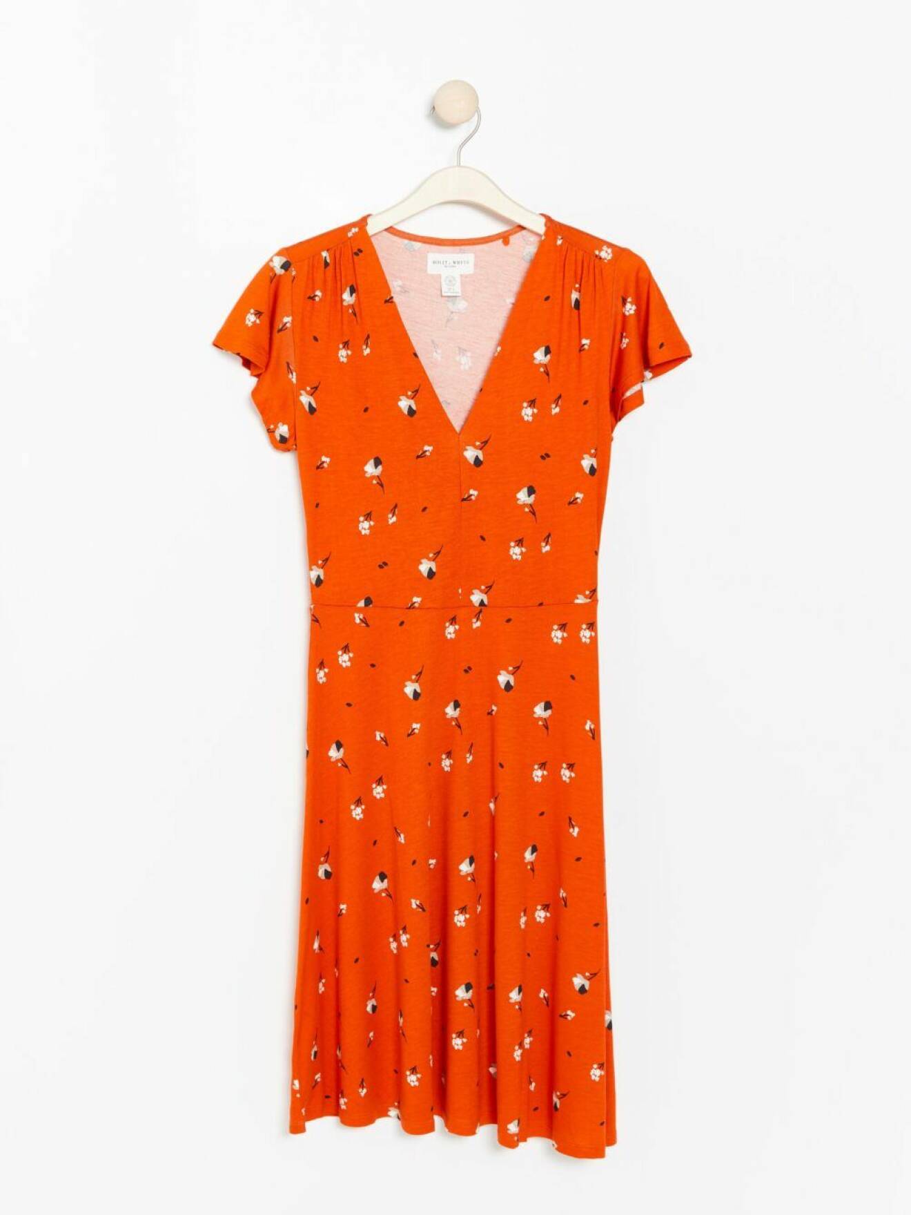 Orange klänning från Lindex stora storlekar