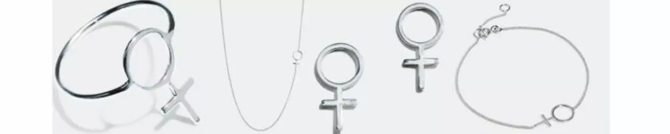 Smycken med kvinnosymbolen