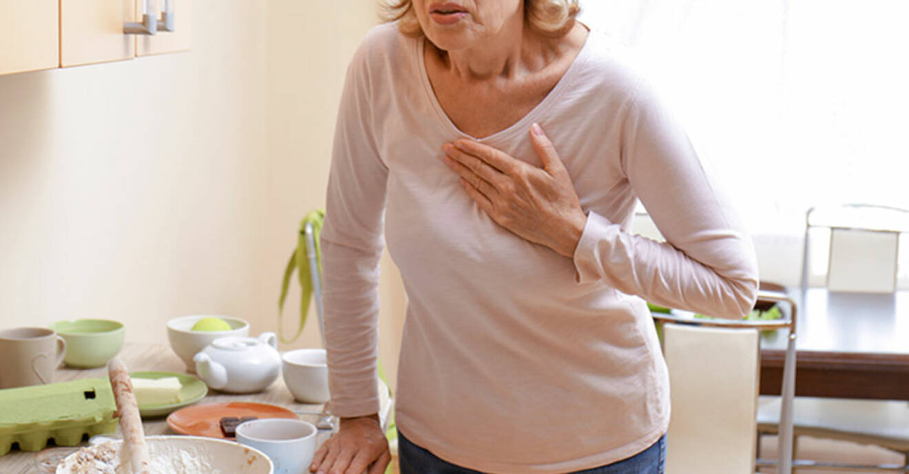 Woman having heart attack at home.