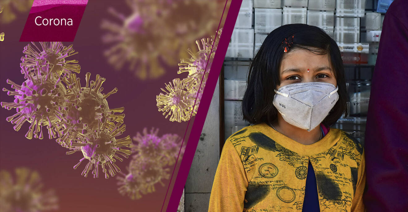 Coronaviruset och en indisk flicka med munskydd.