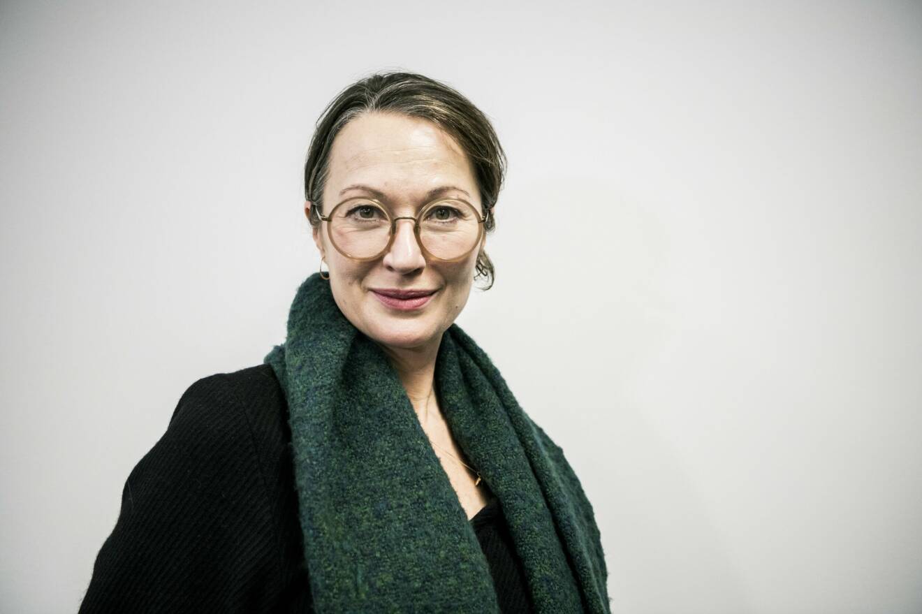 Marina Schiptjenko i en grön halsduk.