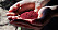Koschenillsköldlöss som har torkats och krossats och bildat ett rött pulver som används som färgämne i en mängd livsmedel.