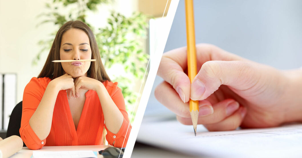 Kvinna sitter vid ett skrivbord och har lagt en näsa under näsan samt en hand som skriver ett test.