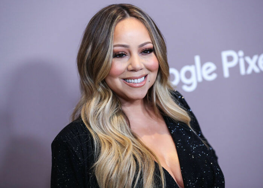 Mariah Carey. Foto: TT Sångerskan Mariah Carey i glittrig, svart klänning.