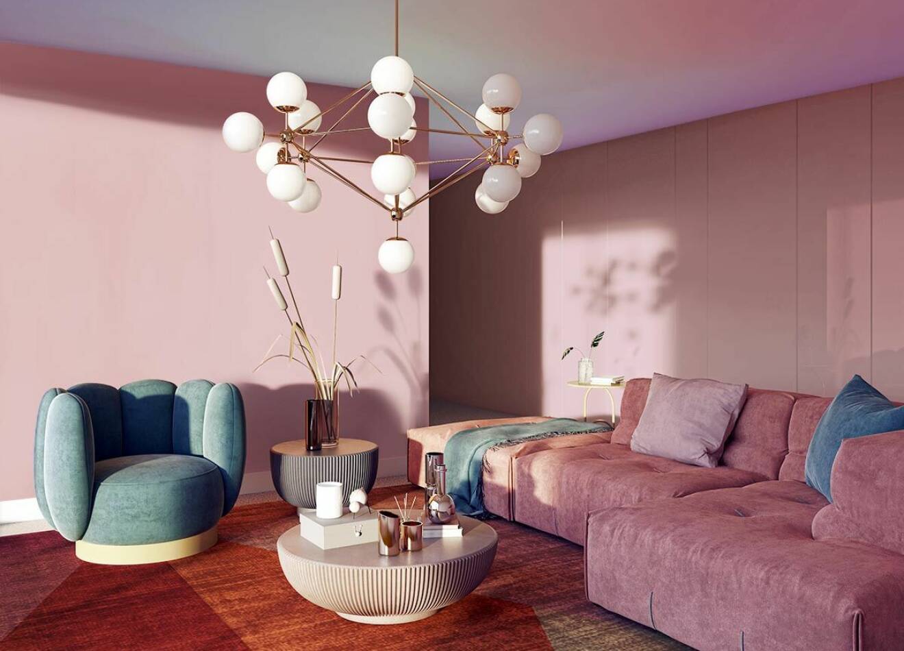 Ett vardagsrum med rosa väggar som Sara Garanty har stylat.
